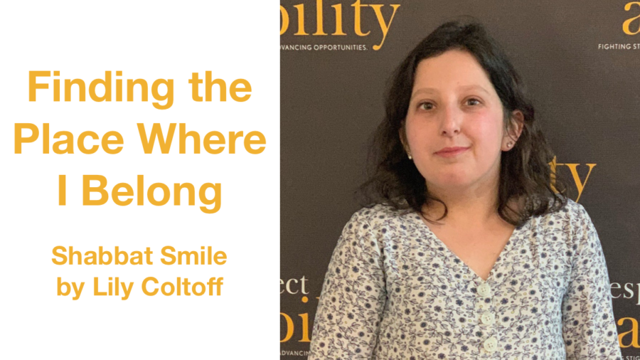 Lily Coltoff smiling in front of the RespectAbility banner. Text: Finding the Place Where I Belong Shabbat Smile by Lily Coltoff