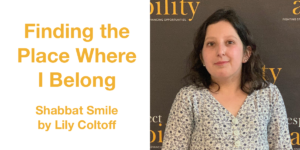 Lily Coltoff smiling in front of the RespectAbility banner. Text: Finding the Place Where I Belong Shabbat Smile by Lily Coltoff