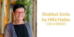 Hilla Hadas smiling headshot. Text: Shabbat Smile by Hilla Hadas CEO of ENOSH