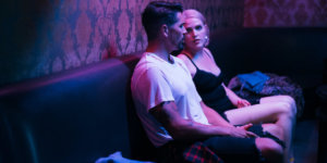 Scene from Single with Kim and Jake on a blind date together inside a bar