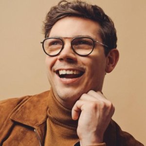 Ryan O'Connell smiling headshot
