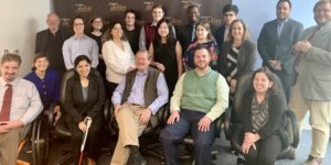 Steve Bartlett with RespectAbility Staff and Spring 2020 Fellows smiling in front of the RespectAbility banner