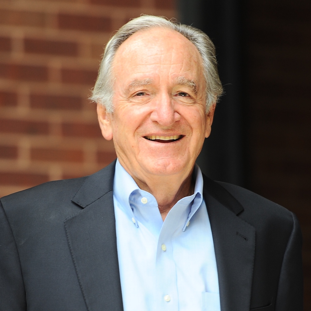 Senator Tom Harkin smiling headshot wearing a suit