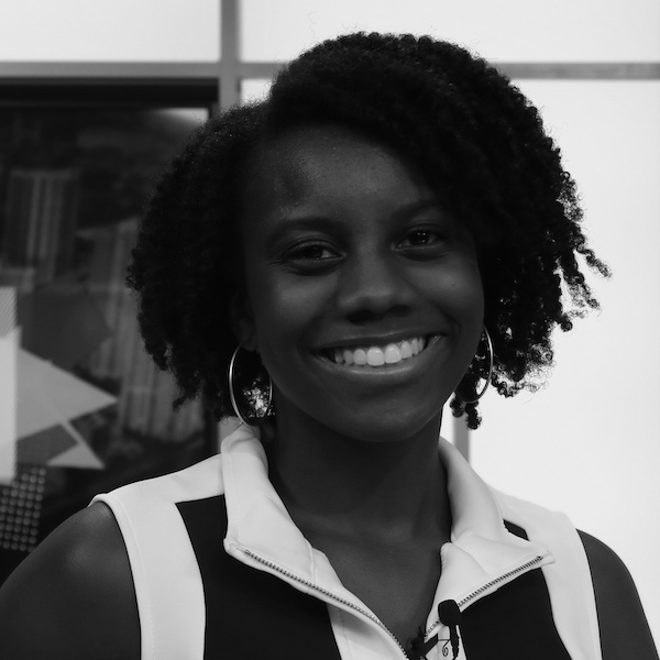 Kianna Dorsey smiling headshot on a television set