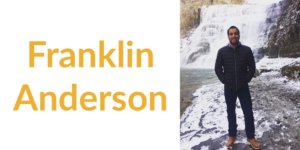 Franklin Anderson smiling, standing in front of a waterfall. Text: Franklin Anderson