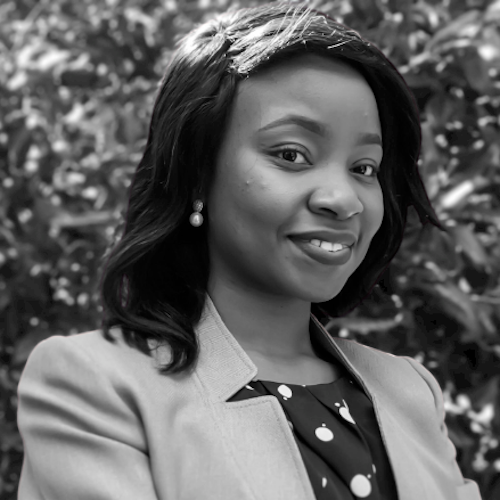 Chinyere Azike smiling black and white headshot