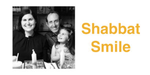 Lauren Appelbaum with her husband and daughter celebrating Passover. Text: Shabbat Smile