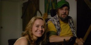 Tobias Forrest and Eileen Grubba smiling in a scene from Dead End Drive