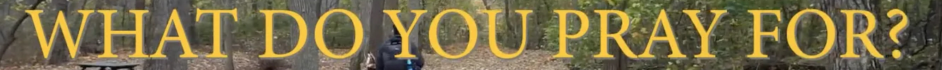 Title card for What Do You Pray For? Ben Rosloff is in the forest in the background