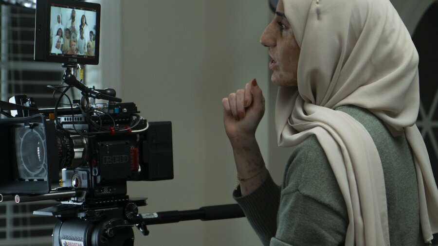 Alaa Zabara behind the camera on a film set