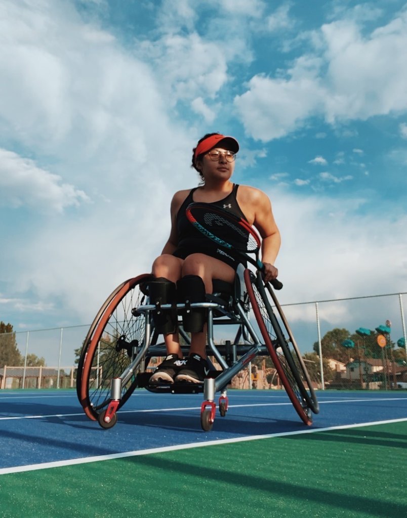 Krista Ramirez-Villatoro on a tennis court