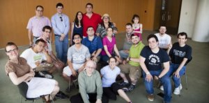 Participants in a program smile together at the JCC Manhattan.