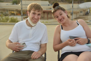 Two participants in a Shalom Institute program smile together