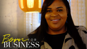Qiana Allen smiling at home. Born For Business logo in bottom left