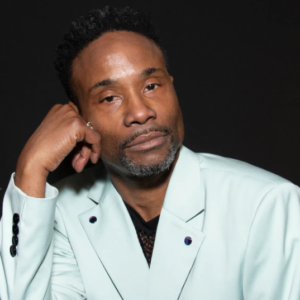 Billy Porter wearing a light blue suit