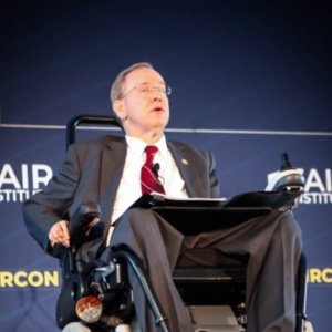 Rep Jim Langevin seated in a wheelchair speaking