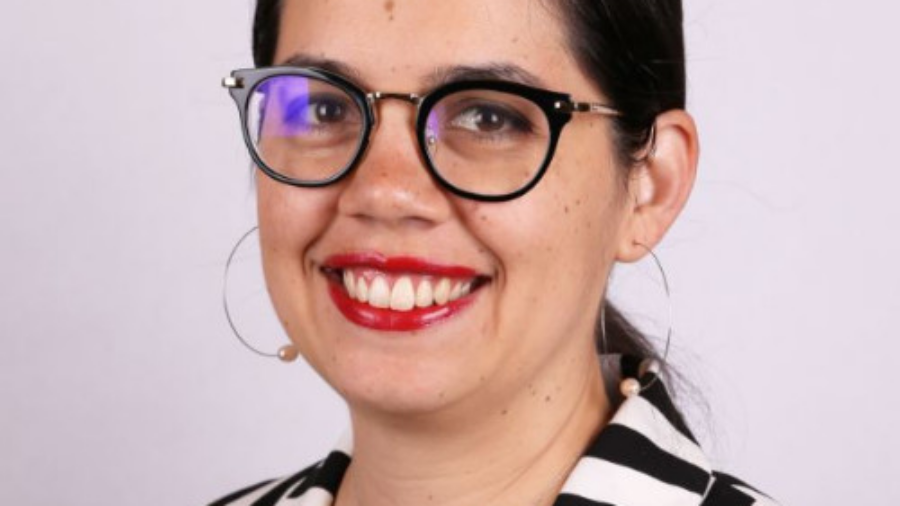 Joy St. Juste smiling headshot