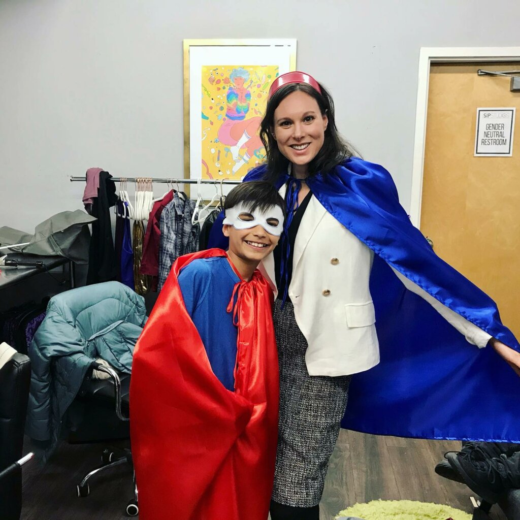 The stars of Andy and Kaliope in costume smiling together