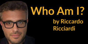 Riccardo Ricciardi smiling headshot. Text: Who Am I? by Riccardo Ricciardi