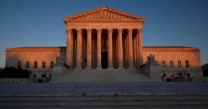 exterior of the Supreme Court building at sunrise or sunset