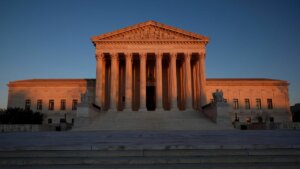 exterior of the Supreme Court building at sunrise or sunset