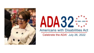 Rabbi Lynne Landsberg at a dinner in 2017. ADA32 logo.