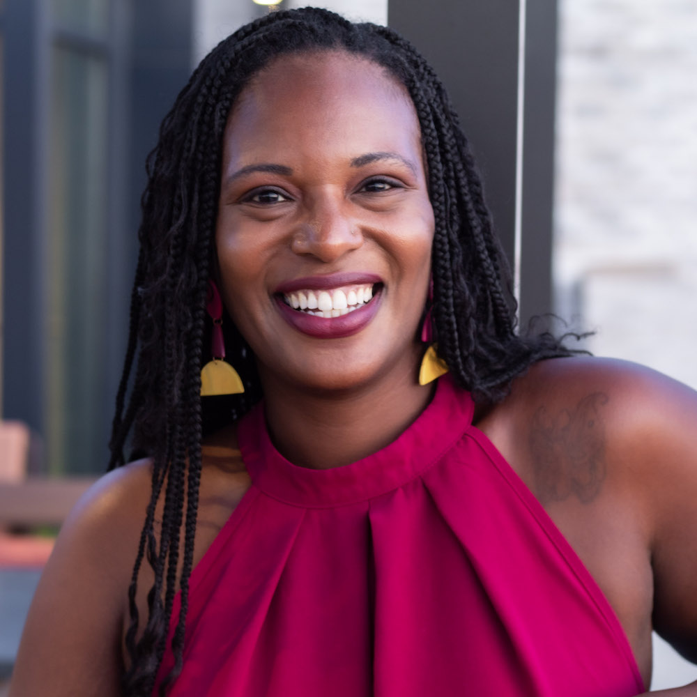 Bianca Casenova Anderson headshot smiling