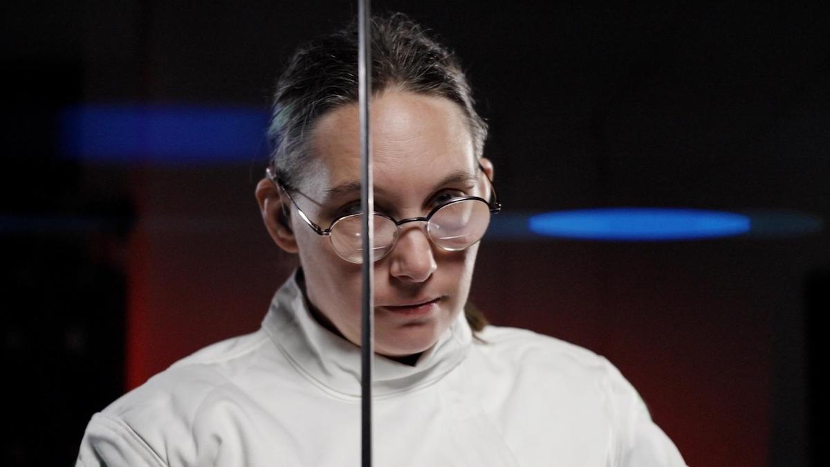 Elsa Sjunneson holding a weapon used in Fencing.