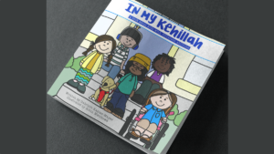 the cover of the book "in My Kehillah" with cover art featuring five children, two with visible disabilities