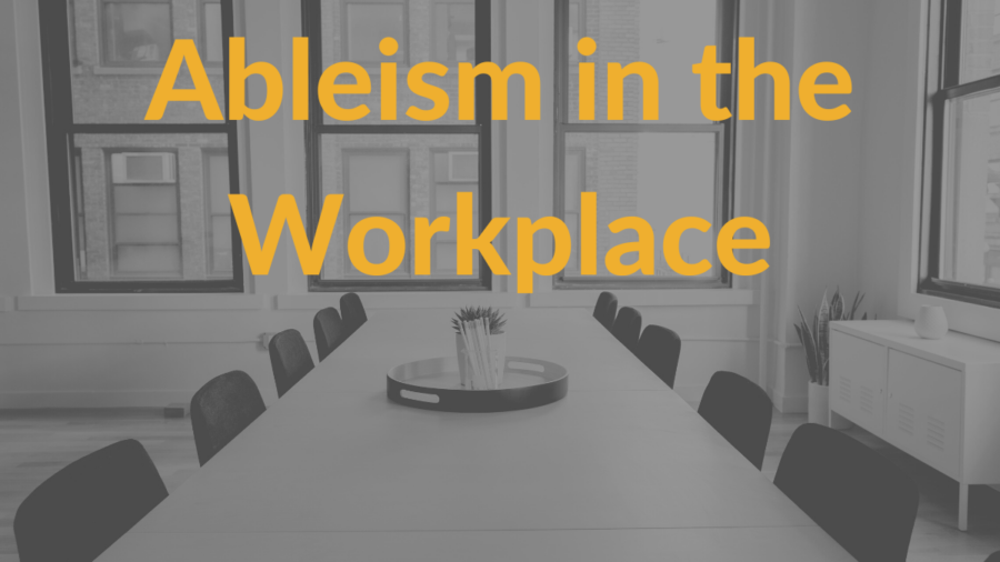 A conference room table in an office with empty chairs around it. Text: Ableism in the workplace.