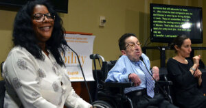 Leah Daniels-Butler and Steven Tingus, along with an ASL interpreter, speaking at a RespectAbility panel in 2017