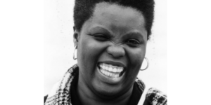 Lois Curtis headshot smiling in black and white