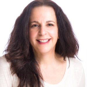 Yvonne Miller Nixon smiling headshot in front of a white background