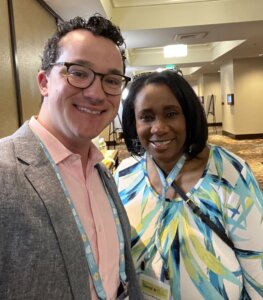 Jimmy Fremgen smiling with Michigan State Rep. Stephanie Young