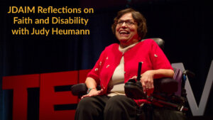 Judy Heumann smiling speaking at TED. Text: JDAIM Reflections on Faith and Disability with Judy Heumann