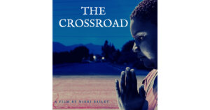 Poster for The Crossroad, a film by Nikki Bailey, with a black woman holding her hands together like she's praying.