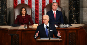 President Biden delivering the 2023 State of the Union with Vice President Harris and Speaker McCarthy behind him.