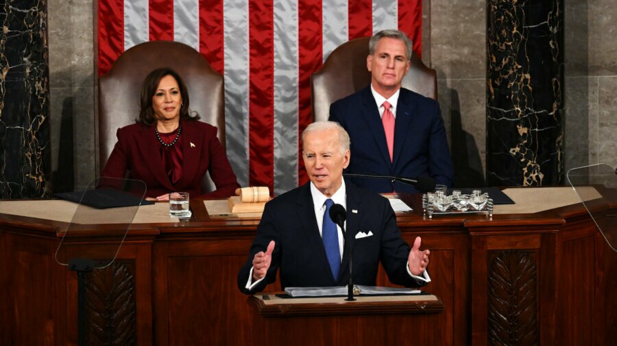 President Biden delivering the 2023 State of the Union with Vice President Harris and Speaker McCarthy behind him.