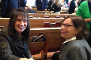 Vivian Bass and Judy Heumann smile together at Adas Israel synagogue