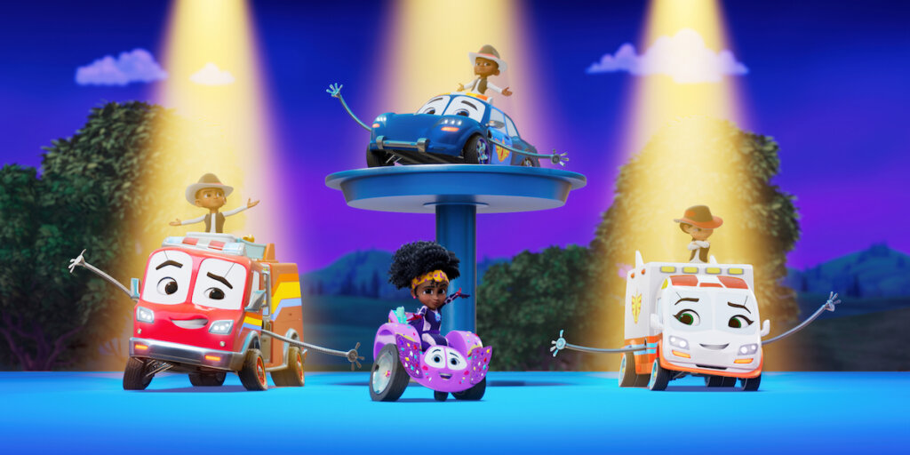Jazzy and Piper dancing with other characters behind them spotlighted in a scene from "All That Jazzy"