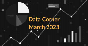 Text: Data Corner March 2023. Background has random charts and graphs.