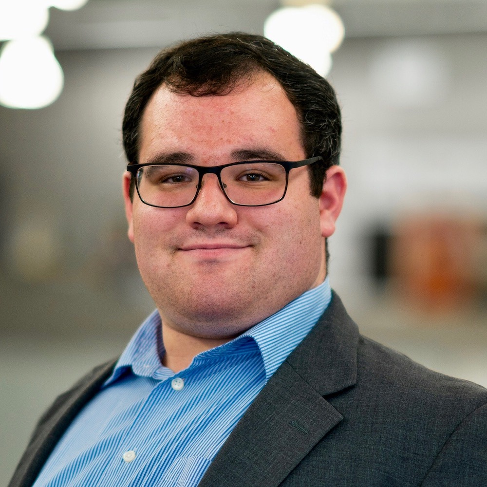 Eric Ascher smiling headshot