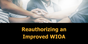 people in business clothes putting their hands together in the middle of a huddle. Text: reauthorizing and improved WIOA