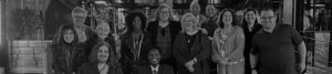 RespectAbility Executive team members and DC-based board and staff smile together outside a restaurant