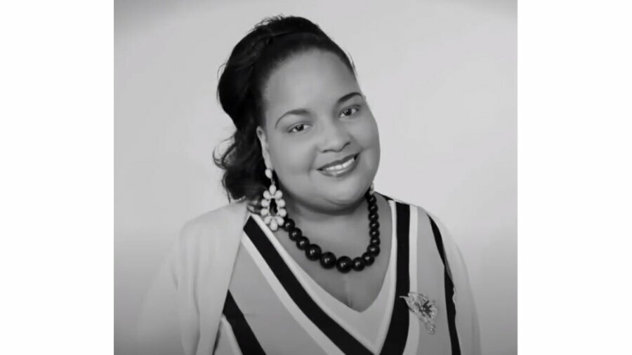 Kaamilah Gilyard smiling headshot in black and white