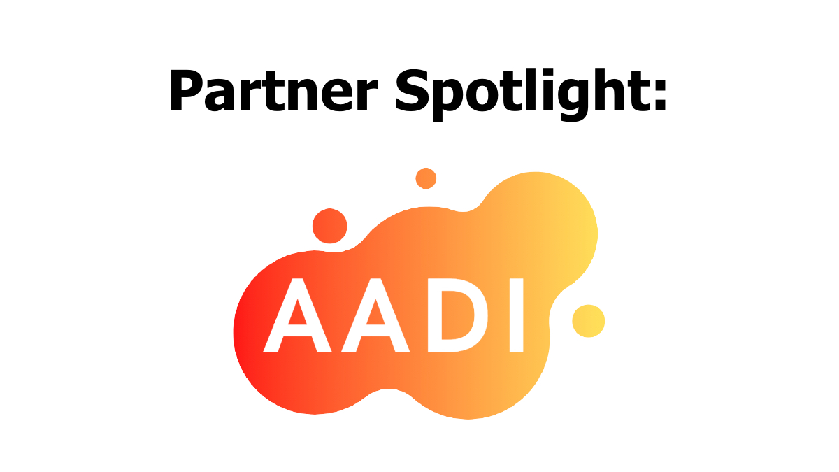 AADI logo. Text reads "Partner Spotlight"