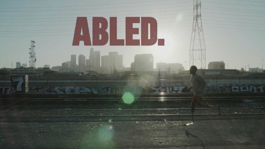 Key art for Abled documentary featuring a shot of Blake Leeper running next to train tracks