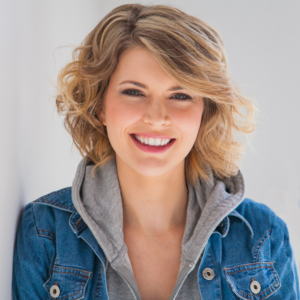 Cheryl Meyer smiling headshot wearing a blue denim jacket