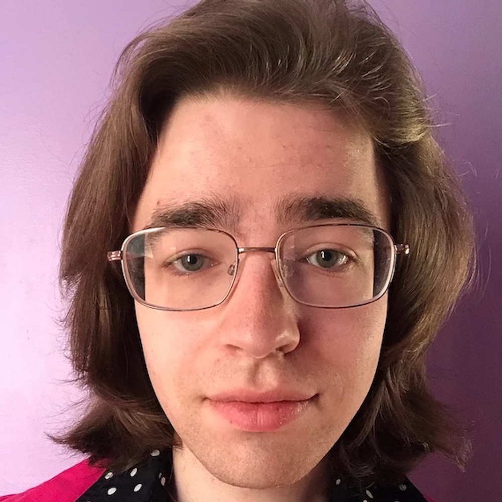 Jackson Tucker Meyer headshot wearing glasses