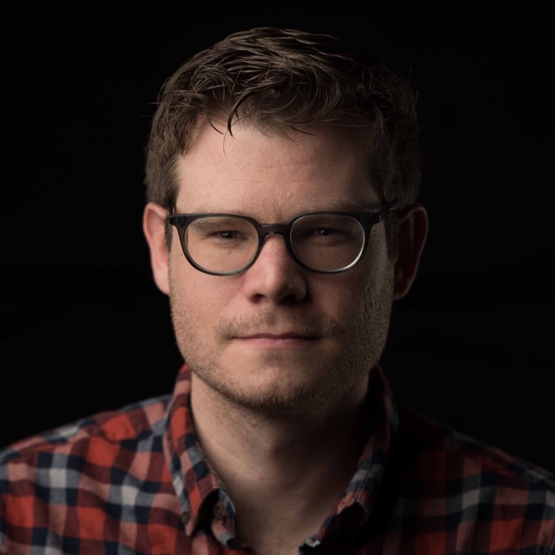 Peter Forbes headshot wearing glasses